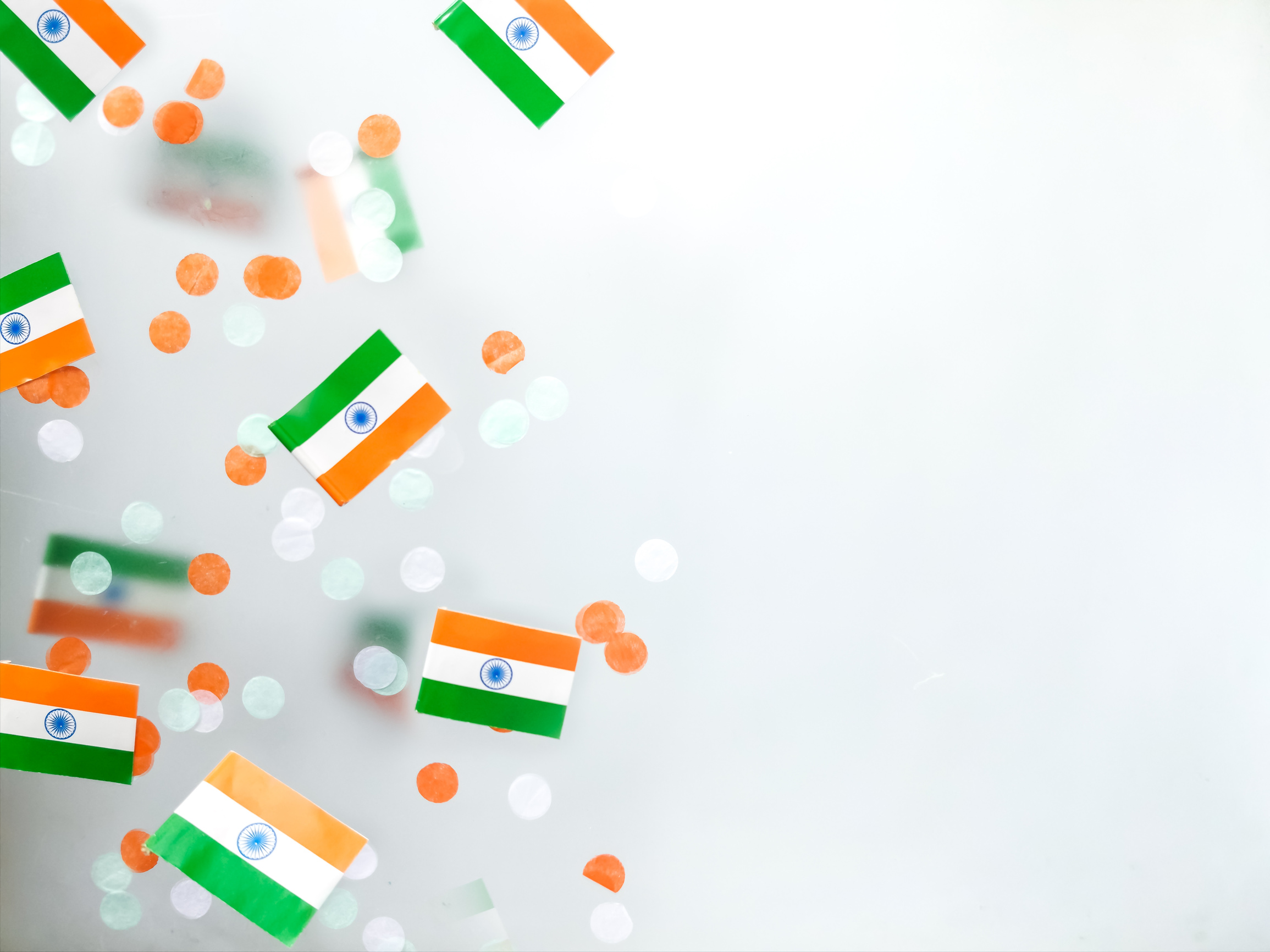 India Independence Day is August 15. Hindi. National flag on a foggy background. Defocusing